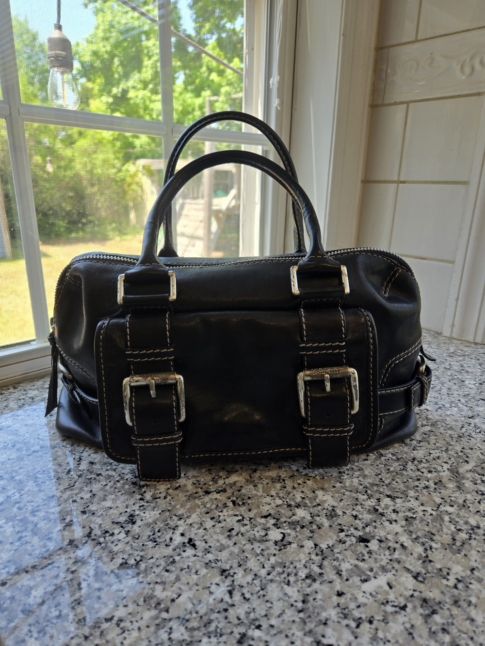 MICHAEL Michael Kors Black Leather Satchel with Silver Buckles